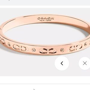 Kissing C’s COACH bangle